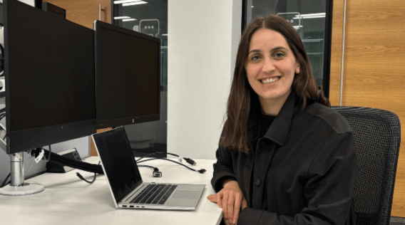 a girl sitting on a desk