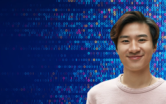 Smiling young man in front of a digital background with binary code representing technology.