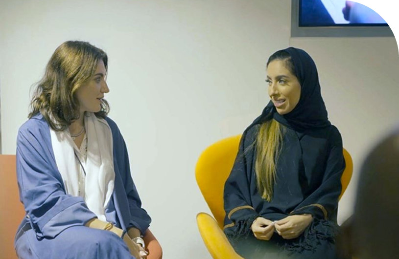 Two women are taking together.