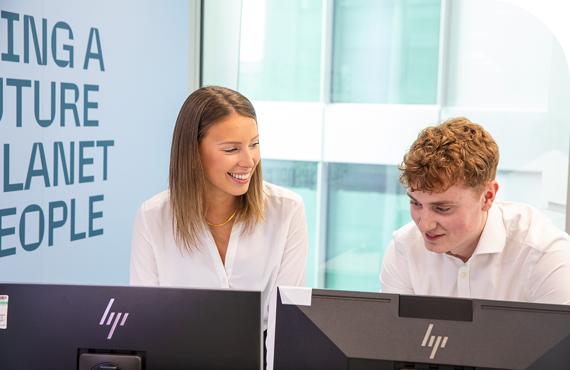 two persons discussing