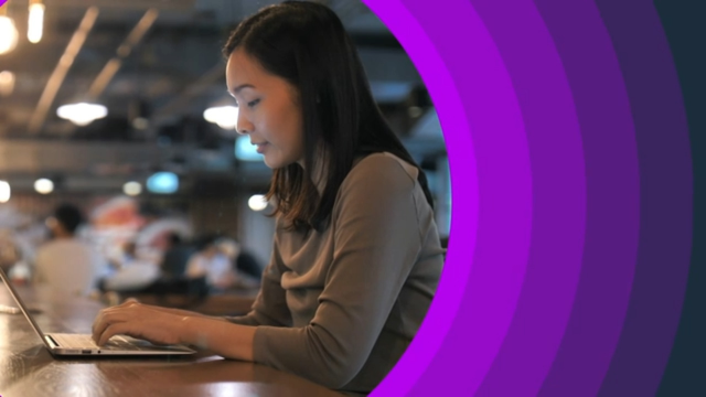 a women has laptop on the desk.