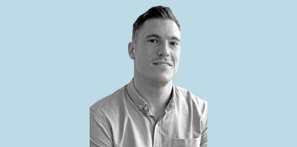 Portrait of a man in a light button-up shirt