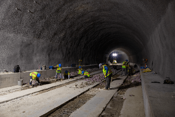 Construction workers building tunnel for light rail