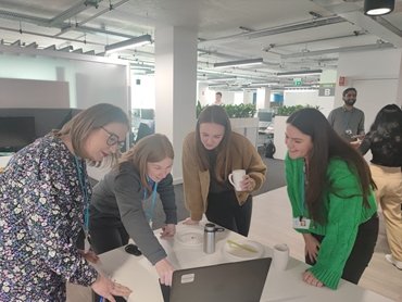 a group of people working .