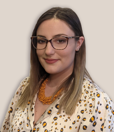 Photo of Della-Maria smiling towards the camera