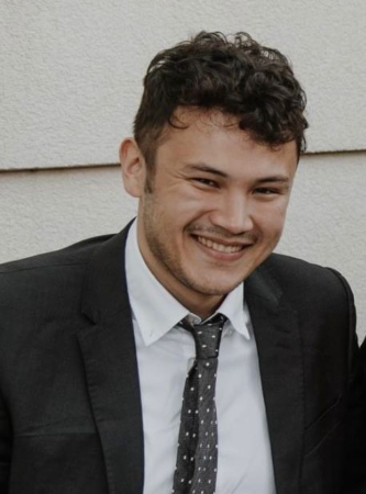 Photo of Harry smiling towards the camera