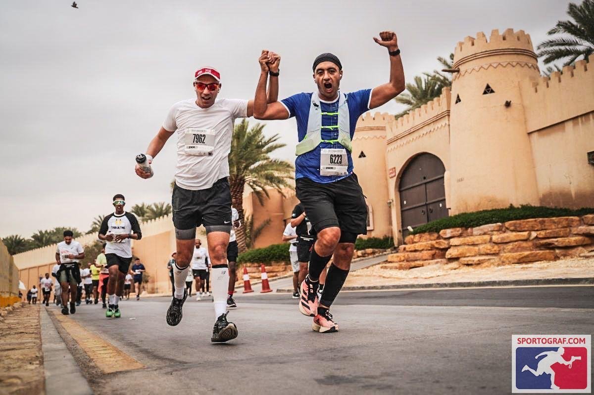 Group of people running marathon