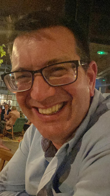 A Picture of Paul smiling.