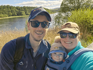 Picture of Curtis with family outdoors