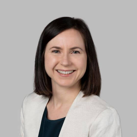 Picture of Monica smiling towards the camera