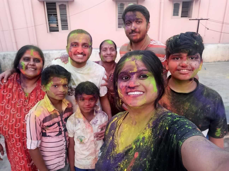 Puneeth playing holi with family