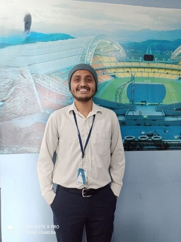 Punith in office attire