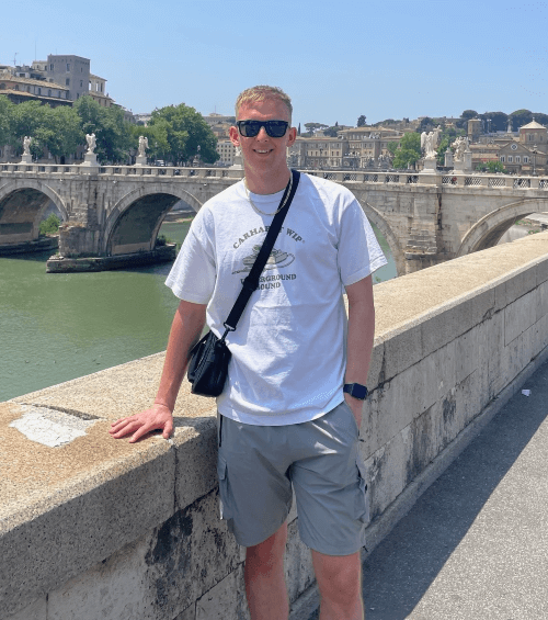 Ryley standing near a bridge