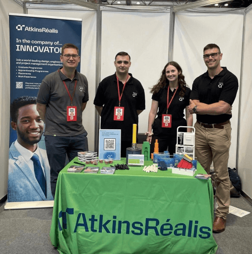 A picture of Eva and her colleagues at a careers fair