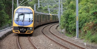 train in australia coming down the track towards the camera