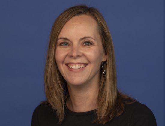 Image of Nicole smiling at the camera