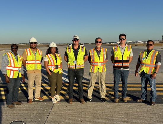 Felix with his colleagues at airport