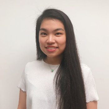 Photo of Waityng smiling towards the camera