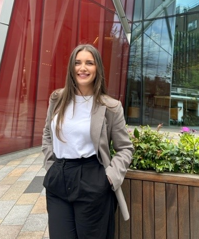 Photo of Rebecca smiling towards the camera