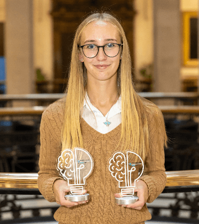 Photo of Rebecca smiling towards the camera