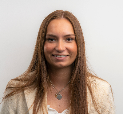 Photo of Mia smiling towards the camera