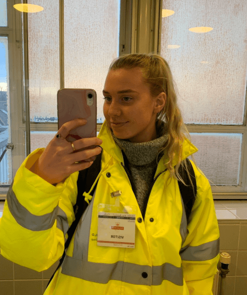 A mirror selfie of Alex in her safety suit